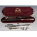 A silver mounted stag antler handled two-piece carving knife and fork set with steel blade and