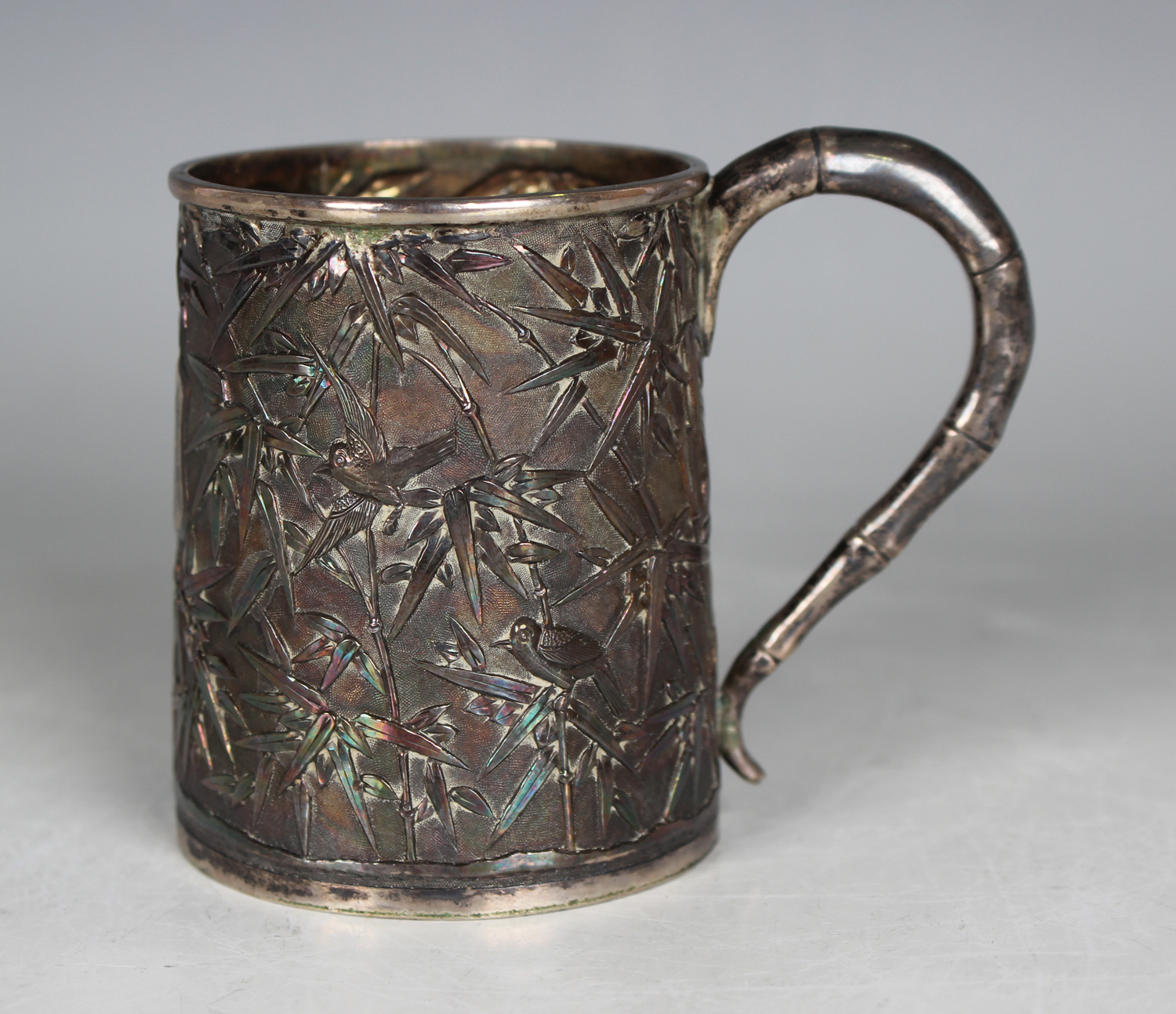 A late 19th/early 20th century Chinese silver christening tankard of slightly tapered cylindrical