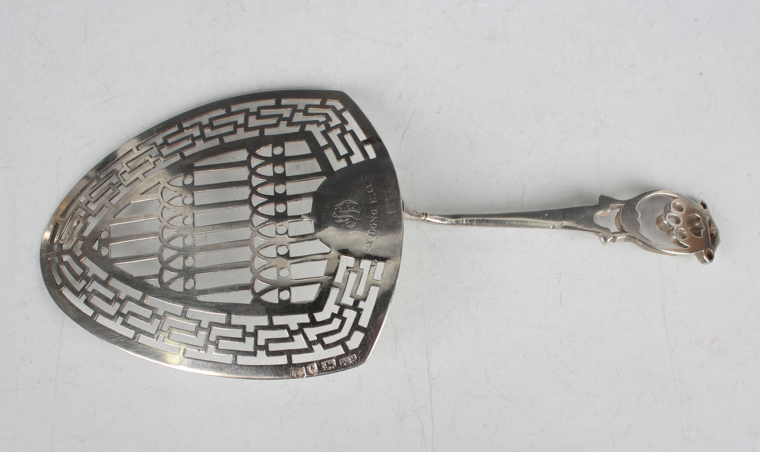 A George III silver fish slice with pierced scroll handle and geometric pierced blade united by a - Image 4 of 4