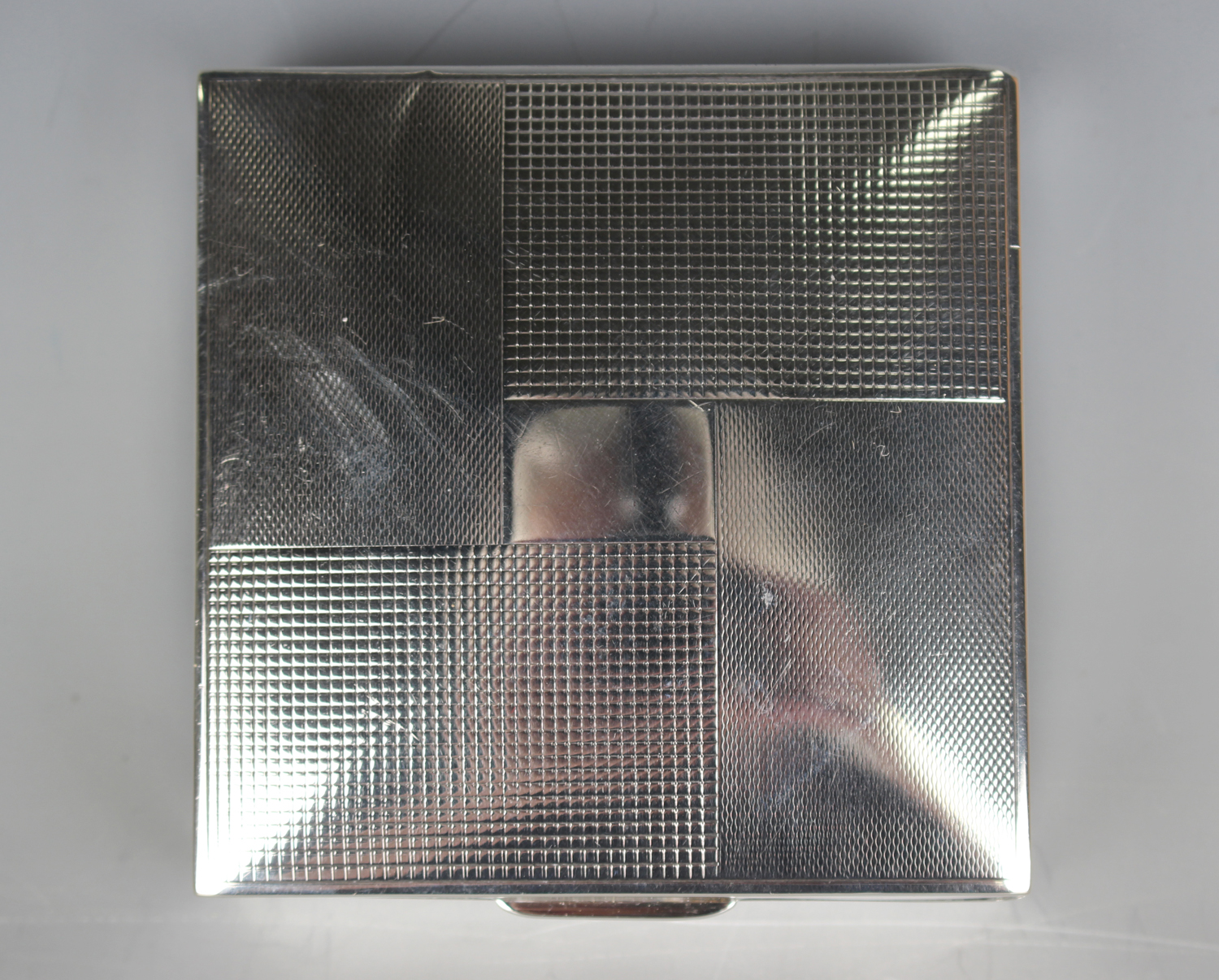 An Elizabeth II silver square cigarette box with geometric engine turned hinged lid, Birmingham 1954 - Image 6 of 7
