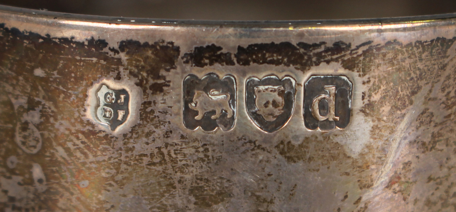 An Edwardian silver vase of slightly flared cylindrical form, embossed with panels of flowers, on - Image 4 of 4