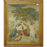 A Victorian Berlin woolwork panel depicting the Finding of Moses, 74cm x 61cm, within a maple frame,