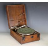 A Dulcetto portable mechanical gramophone within an oak case, width 29.5cm.Buyer’s Premium 29.4% (