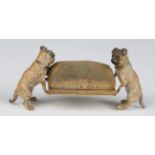 A late 19th century Viennese cold painted cast bronze novelty pin cushion, modelled in the form of
