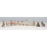 A group of twelve early 20th century cold painted cast bronze models of Beatrix Potter characters,