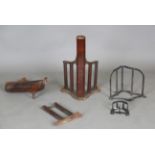 Two matching cast iron saddle racks by Musgrave, Belfast, each with teak mounts, length 50.5cm (