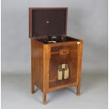 An Art Deco walnut cased radiogram record player by G. Marconi, with Bakelite fittings and inlaid