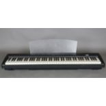 A Yamaha P-95 digital piano, length 132cm.Buyer’s Premium 29.4% (including VAT @ 20%) of the
