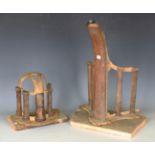 A late 19th century cast iron saddle rack by Musgrave, Belfast, and a similar cast iron bridle rack,