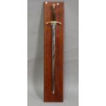 A late 20th century Wilkinson Sword presentation sword, blade length 87cm, one side of the blade