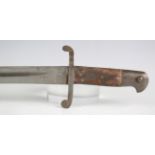An 1856 pattern Enfield sword bayonet with recurved single-edged blade, blade length 58cm, steel
