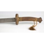 A 19th century Chinese dao with single-edged double-fullered blade, blade length 60cm, circular cast