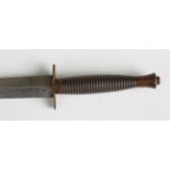 A third pattern Fairbairn-Sykes fighting knife with straight double-edged blade, blade length 17.