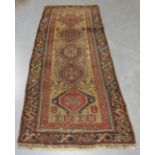 A Shirvan runner, South-east Caucasus, late 19th century, the yellow field with a single column of