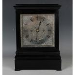 An early Victorian Scottish ebonized mantel clock with eight day twin fusee movement striking