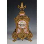 A late 19th century French gilt spelter and Sèvres style porcelain mantel clock with eight day