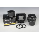 A Zenza Bronica ETRS camera, Serial No. 8123579, with Zenzanon 1:2.8 f=75mm lens, lens hood and
