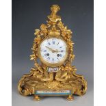 A late 19th century French ormolu and Sèvres style porcelain mantel clock with eight day movement