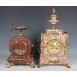 A late 19th century rouge marble and gilt metal mantel clock with eight day movement striking on a