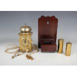 A mid to late 19th century Japanese engraved brass kake-dokei lantern timepiece with alarm, the