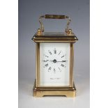 A 20th century gilt brass cased carriage timepiece, the white enamelled dial inscribed 'Mappin &