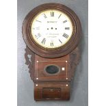 An early Victorian rosewood drop dial wall clock with eight day twin fusee movement striking on a