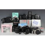 A collection of Canon cameras, lenses and accessories, comprising RT camera body, EOS IX camera