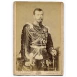 PHOTOGRAPHS. A collection of cartes-de-visite and cabinet-size photographs in an album and loose,