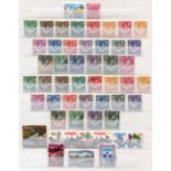 A collection of British Commonwealth stamps in four albums, six stock books and approval books