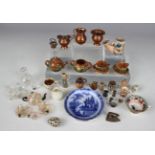 A small group of miniature glass, china and metal tablewares, late 19th century and later, including