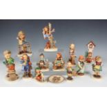 Twelve Goebel Hummel pottery figures, including Hear Ye, Hear Ye, Band Leader and A Fair Measure,
