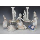 Five Lladro figure groups, comprising Jolie, No. 5210 (lacking parasol), Pretty Pickings, No.