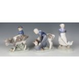 Three Royal Copenhagen figures, designed by Christian Thomsen, comprising Boy with Calf, No. 772,