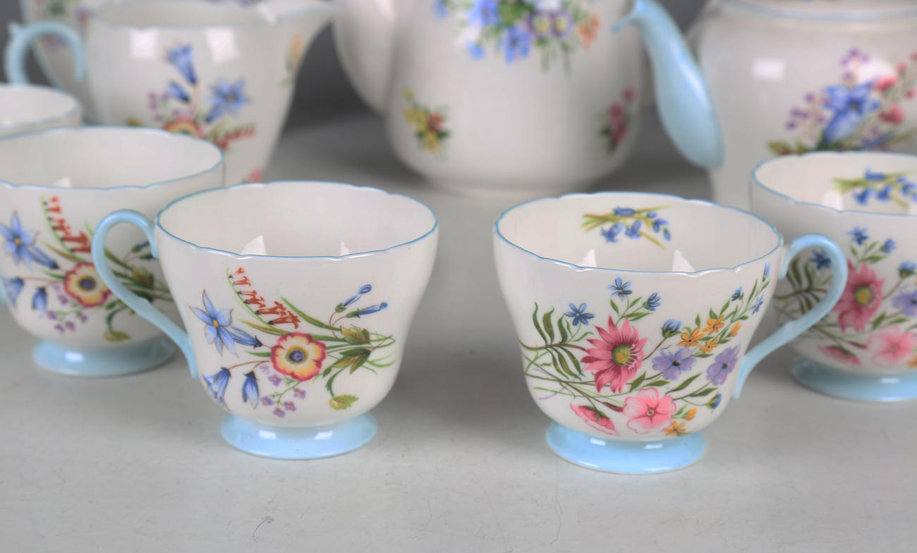 A Shelley Wild Flowers pattern part tea service, comprising cake plate, small teapot and cover, jug, - Image 6 of 6