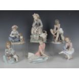 Six Lladro porcelain figures, comprising Ballerina, No. 1357, Can I Help, No. 5689, I Hope She Does,