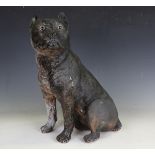 A 20th century painted plaster figure of a seated Staffordshire bull terrier, height 53cm (some