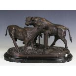 After Pierre-Jules Mêne - a modern brown patinated cast bronze model of two bulls, mounted on a