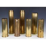 A group of seven brass military shell cases, height of tallest 42cm.Buyer’s Premium 29.4% (including