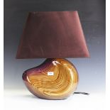 A modern lacquered and carved ply table lamp by Christian Wallis, bearing signature, height to top