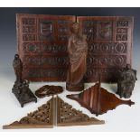 Two 19th century oak panels, each relief carved with a shield crest over Tudor roses, 41cm x 34cm, a