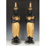 A pair of late 20th century Empire style carved hardwood figural table lamps, each modelled as a