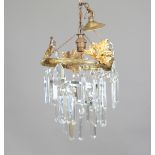 A group of seven 20th century gilt metal and cut glass chandeliers, largest diameter 21cm.Buyer’s