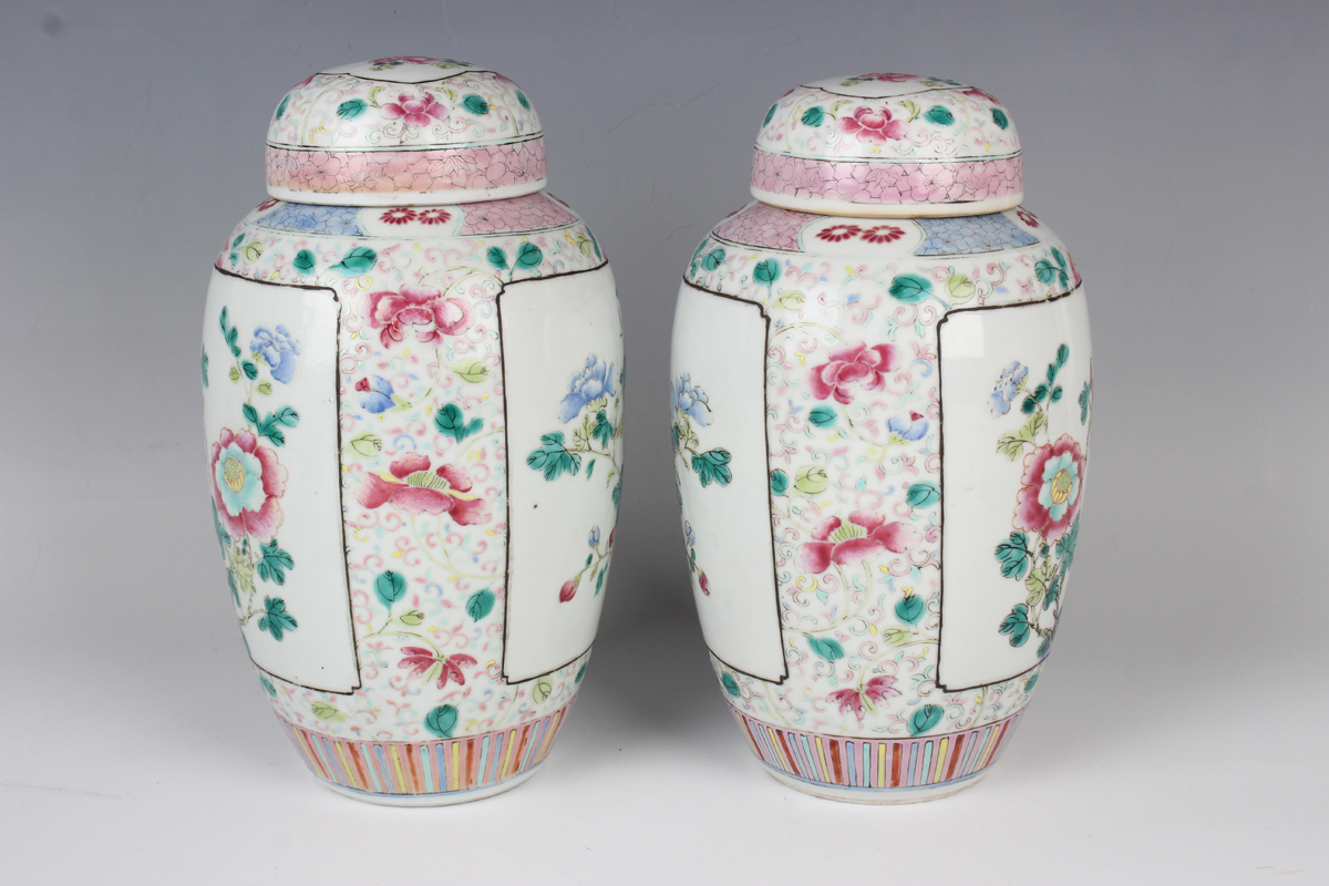 A pair of Chinese famille rose porcelain jars and domed covers, late Qing dynasty, each elongated - Image 12 of 12