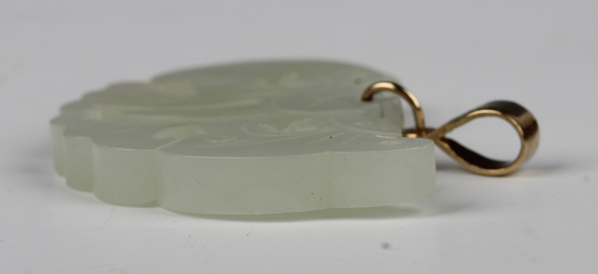 A Chinese pale celadon jade pendant, probably 20th century, carved and pierced in the form of a - Image 4 of 8