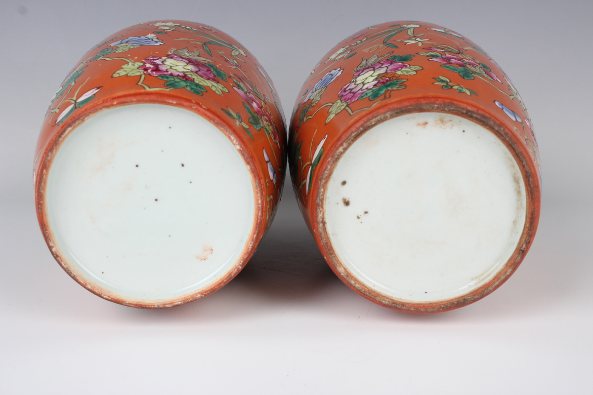 A pair of Chinese famille rose coral ground porcelain jars and covers, early 20th century, each of - Image 4 of 10