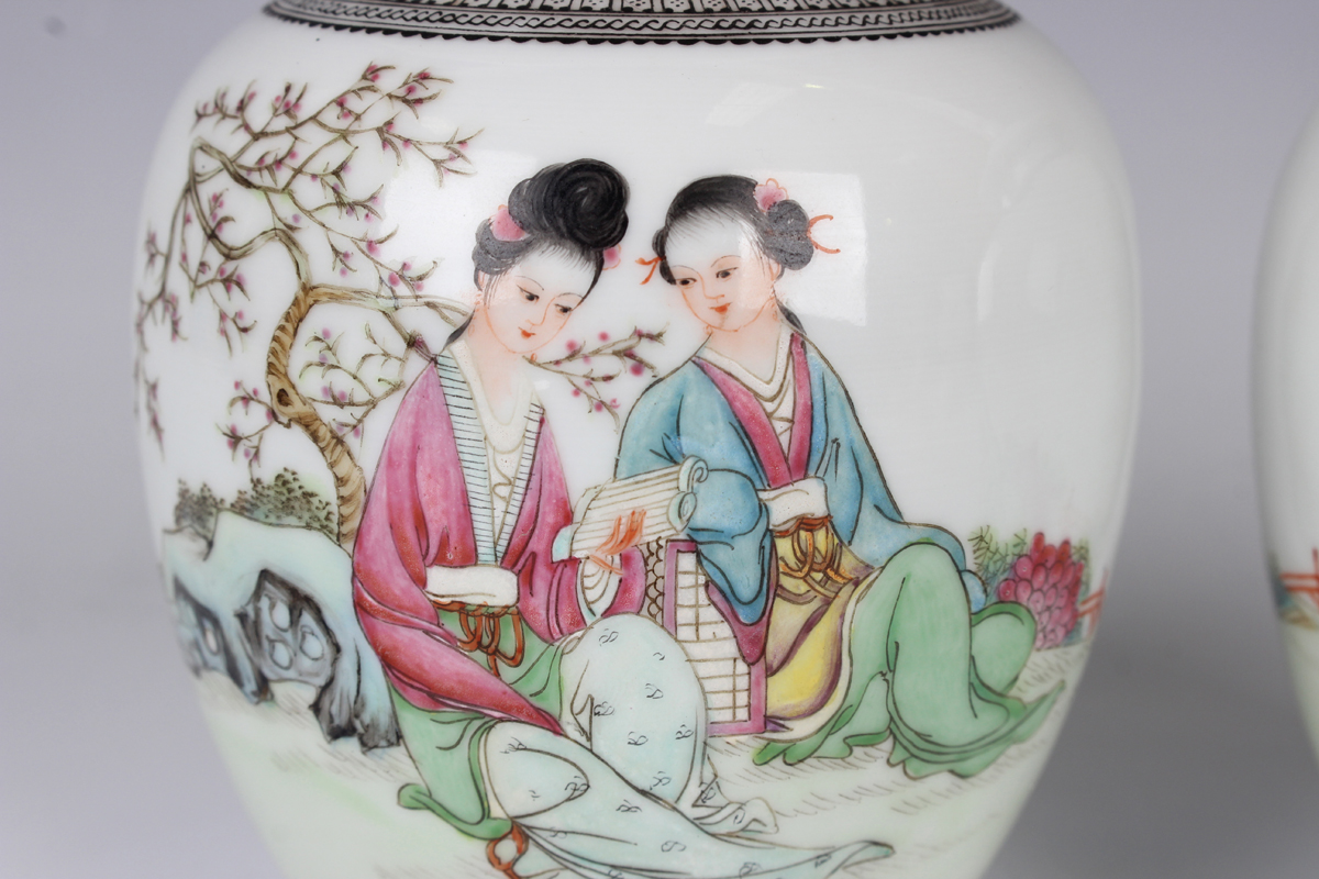 A pair of Chinese famille rose porcelain jars and covers, 20th century, each ovoid body painted with - Image 11 of 14