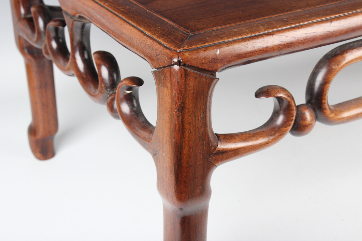 A Chinese hardwood low table, early 20th century, the rectangular panelled top above a carved and - Image 7 of 18
