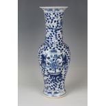 A Chinese blue and white porcelain vase, probably 20th century, the baluster body with extended neck