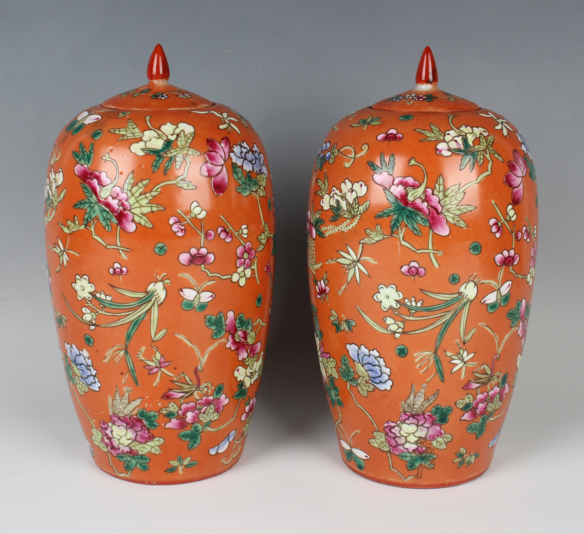 A pair of Chinese famille rose coral ground porcelain jars and covers, early 20th century, each of - Image 7 of 10