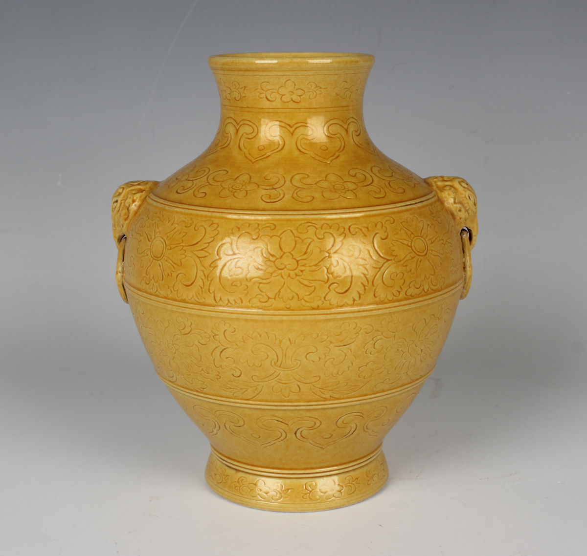 A Chinese yellow enamelled biscuit porcelain vase, mark of Qianlong but 20th century or later, of hu